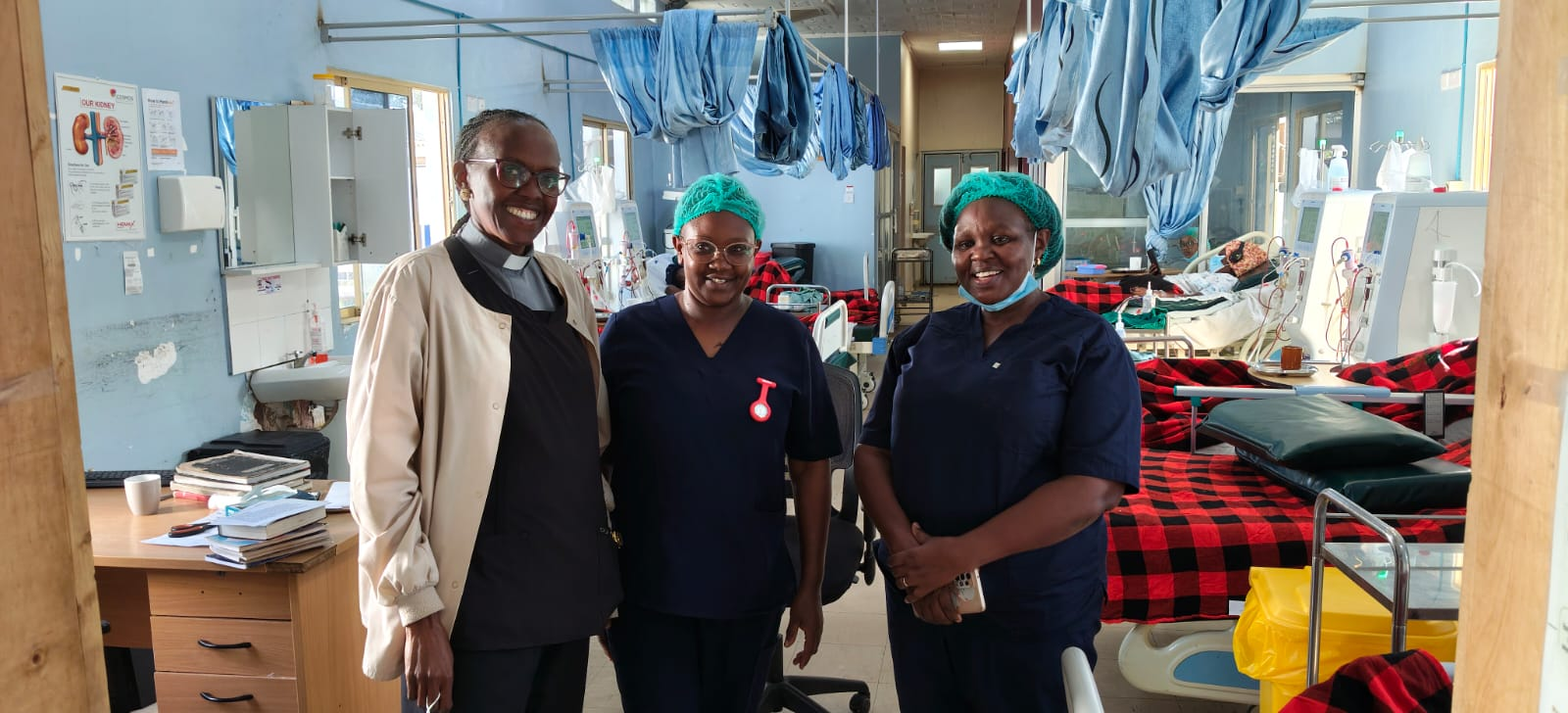Rev. Irene with nursing colleagues in a clinical care setting