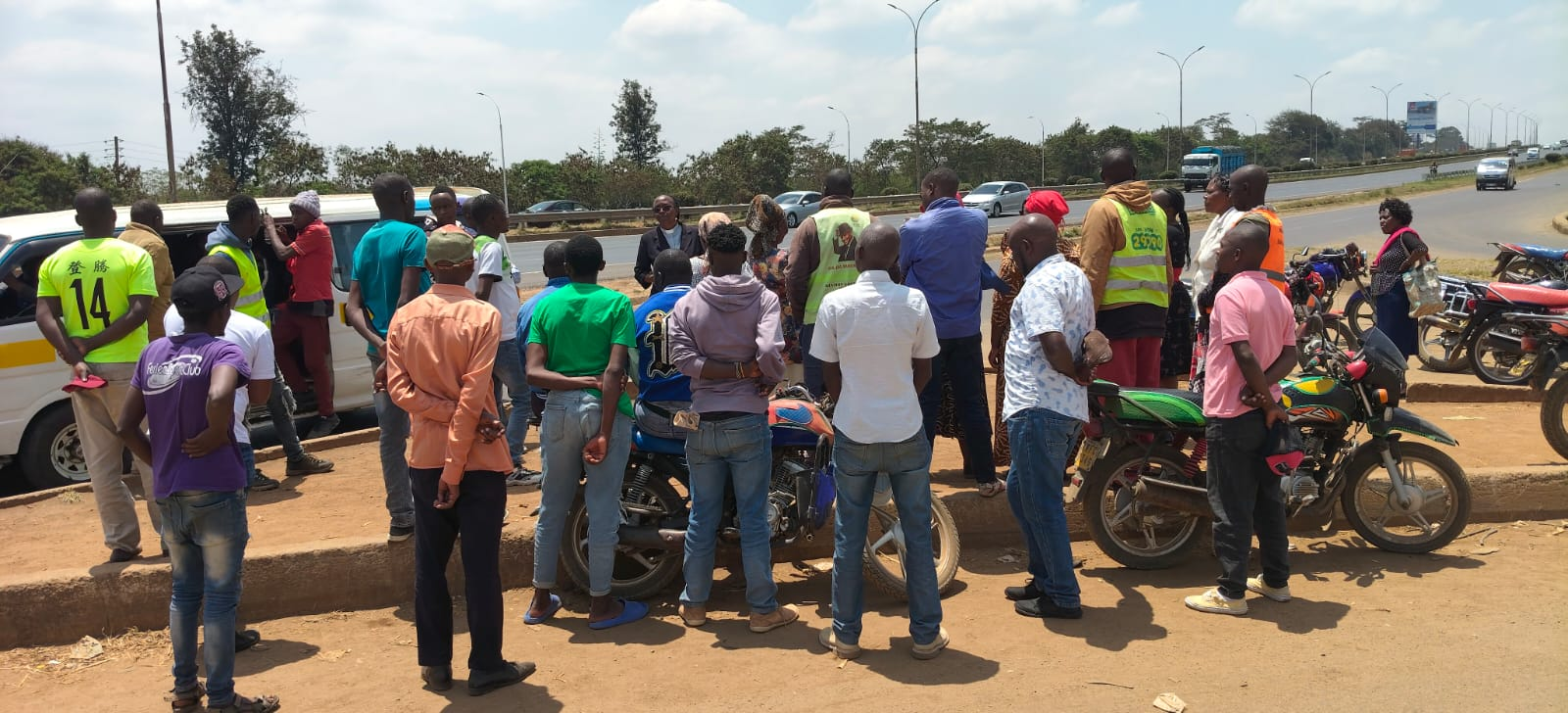 Rev. Irene speaking with a roadside community group
